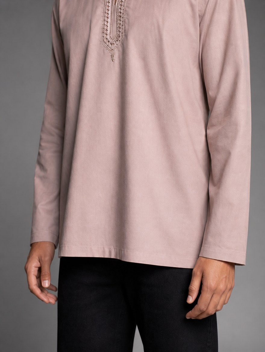 Midsection view of men's peach short kurta showing straight bottom hemline and relaxed fit sleeves