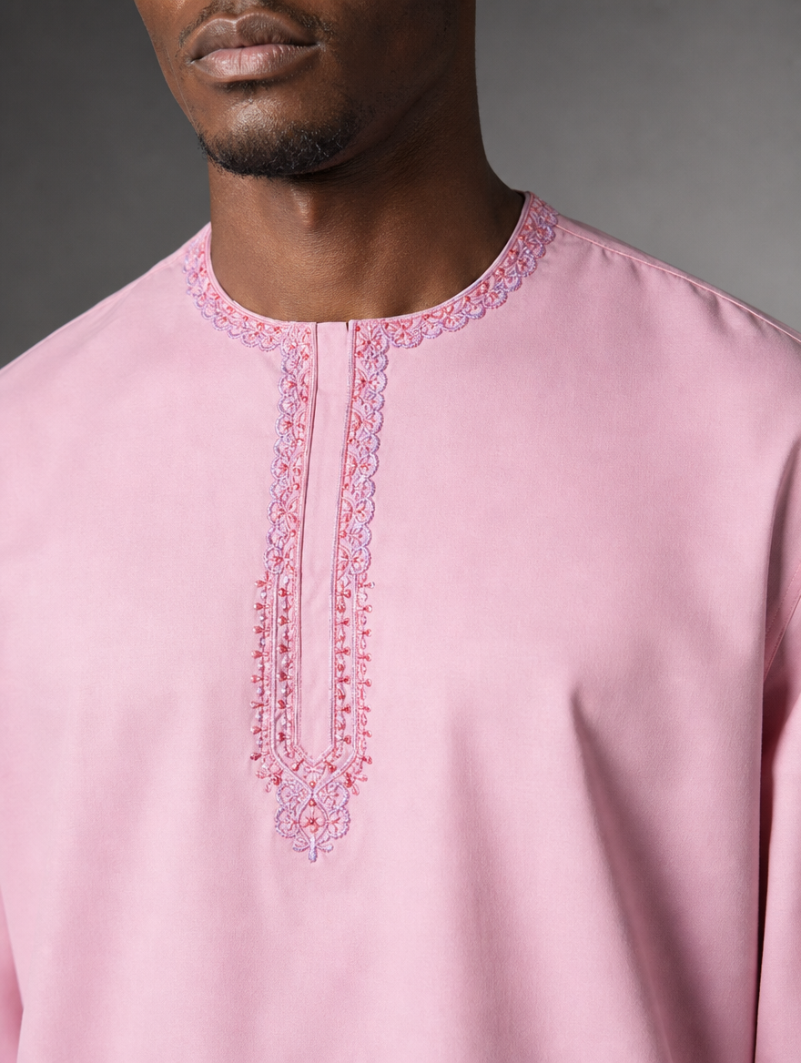 Detailed close-up of intricate purple and pink thread embroidery around the round neckline placket of Urban Crescent short kurta.