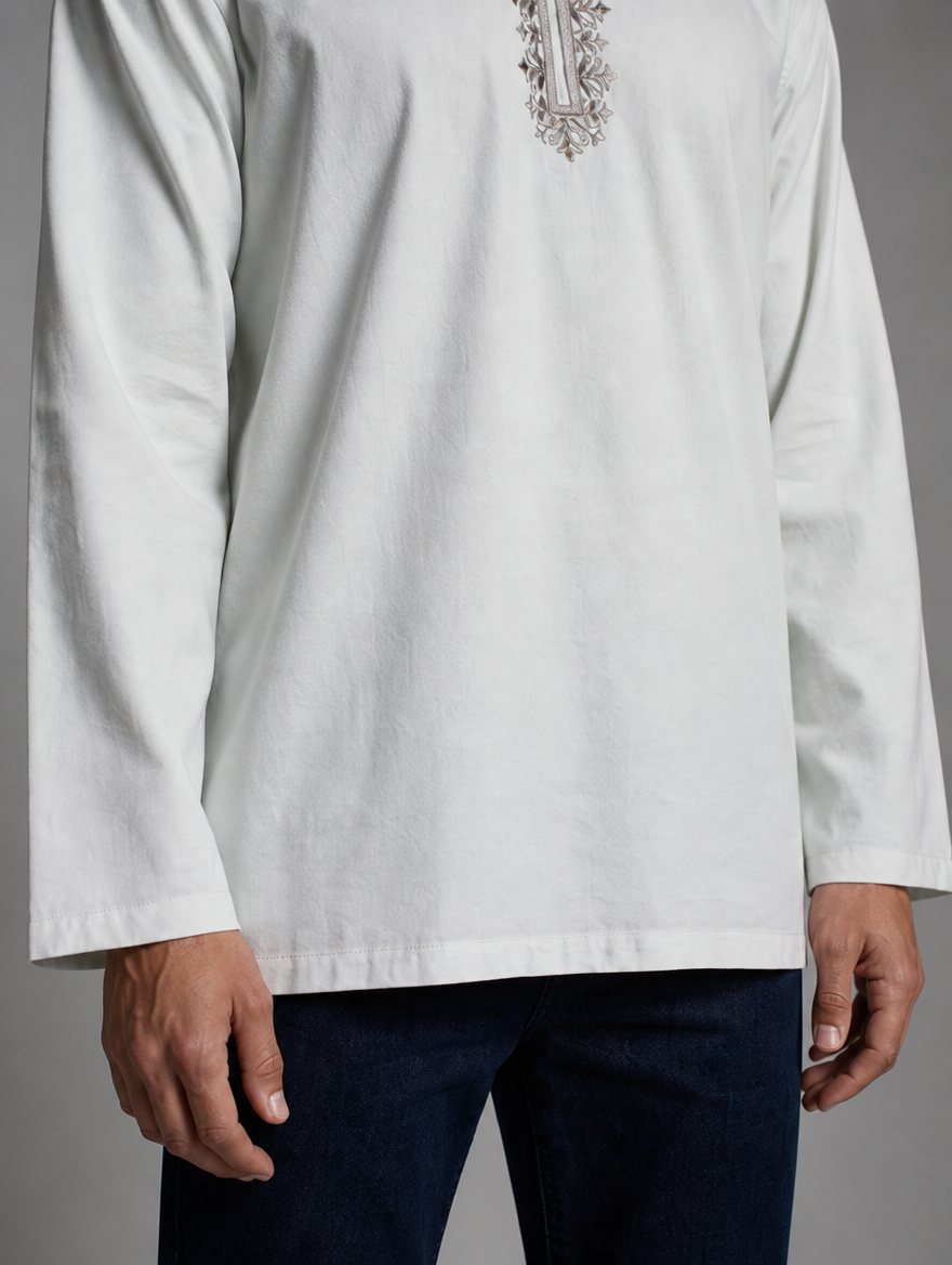 Lower front view of men's pista green short kurta showing straight bottom hem and comfortable long sleeve fit